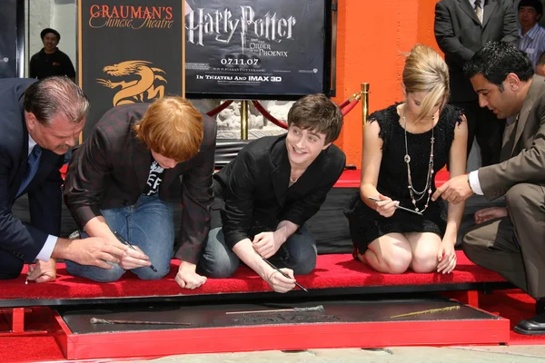 Rupert Grint with Daniel Radcliffe and Emma Watson — Stock Photo, Image