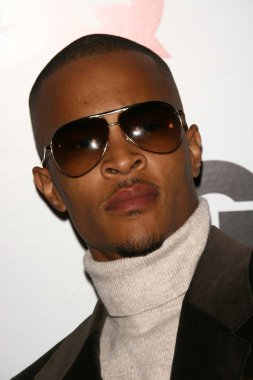 T.I.