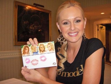 Katie Lohmann at the Bench Warmer World Cup 2006 Trading Cards Autograph Session. Bel Age Hotel, Los Angeles, CA. 06-22-06 clipart