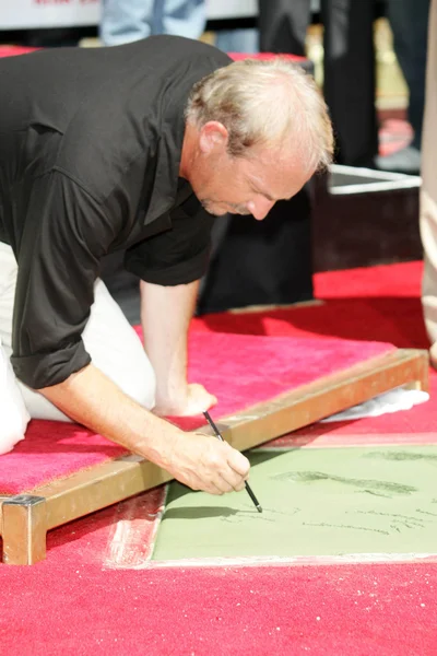 Kevin costner dłoni i stóp wydrukować ceremonii — Zdjęcie stockowe