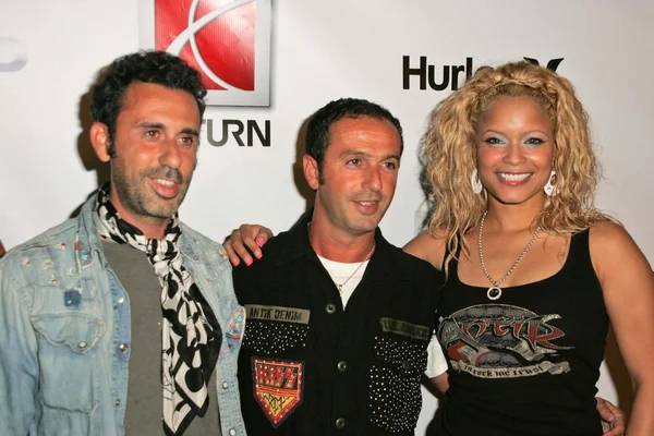 Alexander Caucant and Jules Naouri with Blu Cantrell wearing Clothing by Antik Denim at Saturns X-Games 12 Party. 6820 Hollywood Blvd, Hollywood, CA. 08-02-06 — Stock Photo, Image