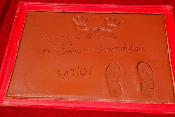 Adam Sandlers hand and foot prints at Sandlers Hand and Foot Print Ceremoney at the Chinese Theater, Hollywood, CA 05-17-05 — Stock Photo, Image