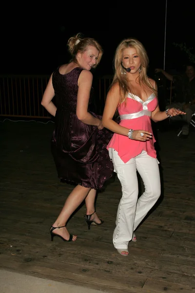 Anna Wilding, Marilyn Fernandez