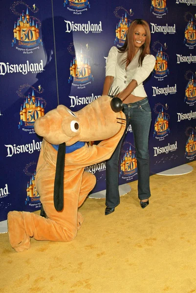 Tyra banks und pluto — Stockfoto