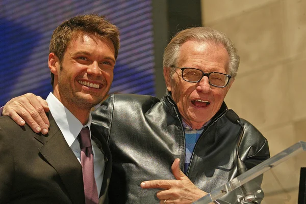 Ryan seacrest en larry king — Stockfoto