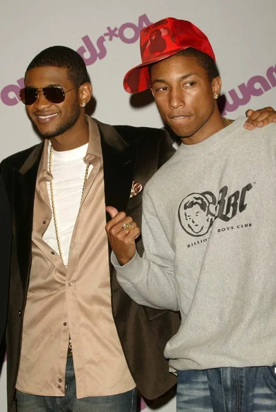 Pharrell williams och usher — Stockfoto