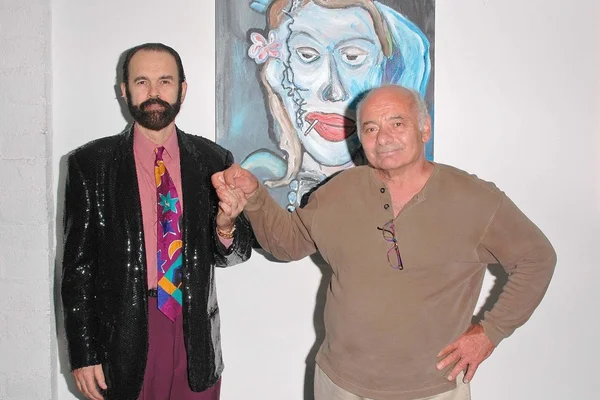 Burt Young with an art opening attendee — Stock Photo, Image