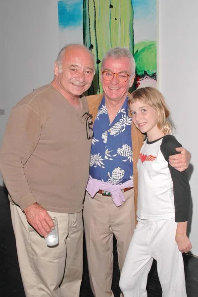 伯特年轻人与导演约翰 · 艾维尔森和他的女儿布丽奇特 — 图库照片