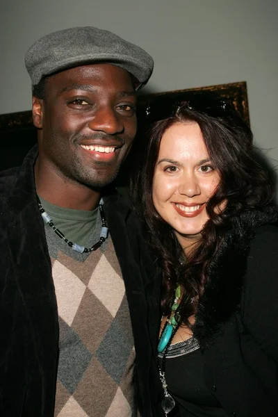 Adewale Akinnuoye-Agbaje and Fileena Bahris — Stock Photo, Image