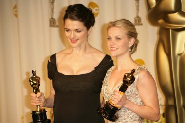 Rachel Weisz and Reese Witherspoon in the press room at the 78th Annual Academy Awards. Kodak Theatre, Hollywood, CA. 03-05-06 clipart