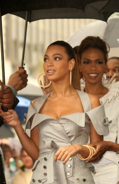 Beyonce Knowles and Michelle Williams at the Ceremony Honoring Destinys Child with the 2305th Star on the Hollywood Walk of fame. Hollywood Boulevard, Hollywood, CA. 03-28-06