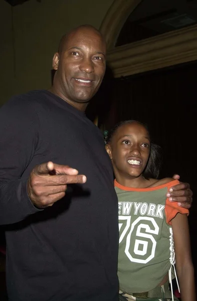 John Singleton and daughter — Stock Photo, Image