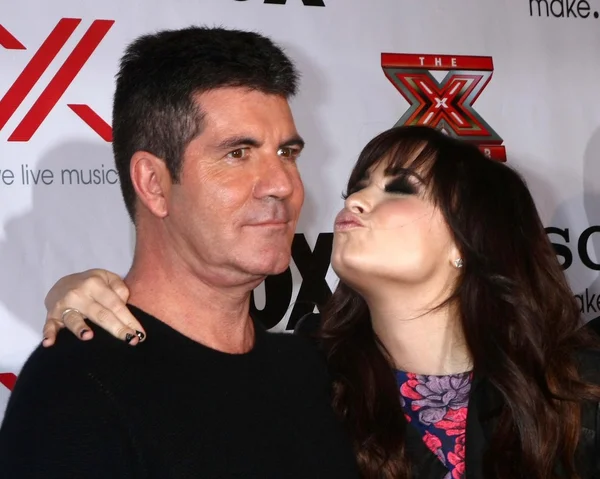 Simon cowell, demi lovato op de x-factor bekijken partij, mixology, los angeles, ca 12-06-12 — Zdjęcie stockowe