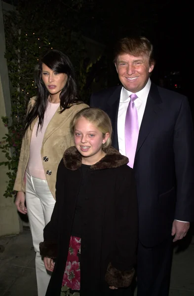 Donald Trump with Melania and child arriving — Stock Photo, Image