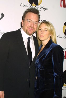 Tom Arnold and wife