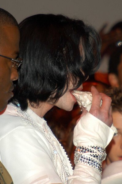Michael Jackson eating birthday cake