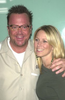 Tom Arnold and wife