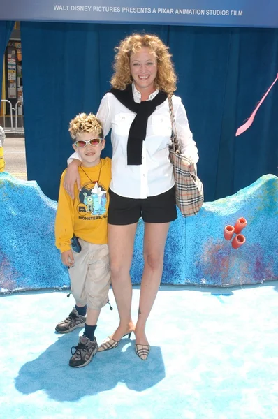 Virginia Madsen and son — Stock Photo, Image