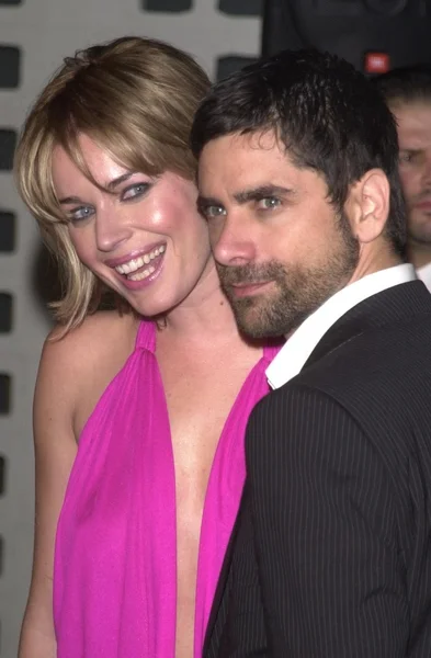 Rebecca romijn-stamos und ehemann john stamos — Stockfoto