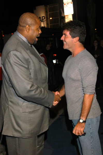 Chi mcbride och simon cowell — Stockfoto