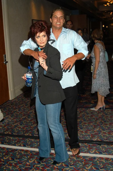 Sharon Osbourne and Travis Fimmel — Stock Photo, Image