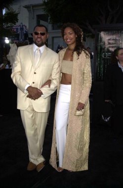 Laurence Fishburne and wife Gina Torres clipart