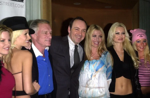 Kevin Spacey with Hugh Hefner and friends — Stock Photo, Image
