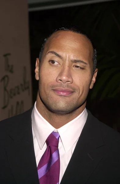 Photos and Pictures - WWF wrestler 'The Rock,' Dwayne Johnson arriving at  GQ Men of the Year Awards. October 21, 2003.