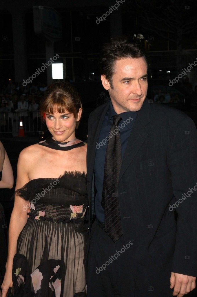 Amanda Peet y John Cusack — Foto editorial de stock © s_bukley 17784345