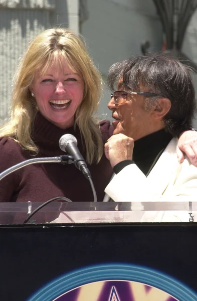 Cheryl Tiegs con Robert Evans — Foto Stock