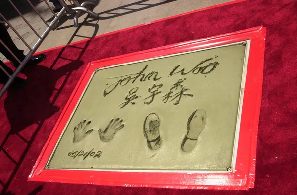 Las huellas de pies y manos de John Woo — Foto de Stock