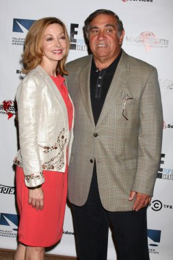Sharon Lawrence, Dan Laurin