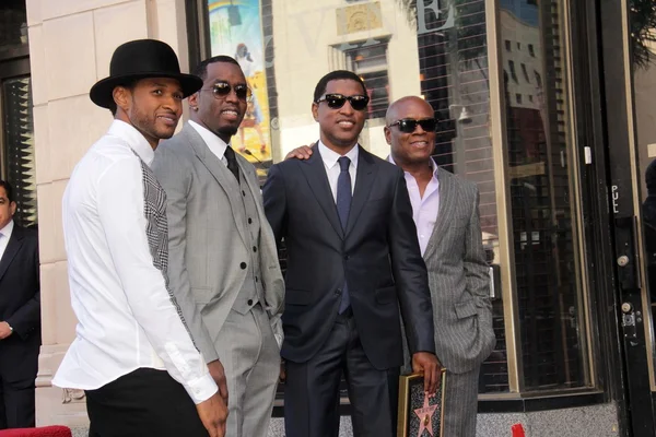 Kenny "mazlíček" edmonds, usher, sean combs, antonio m. "l.a." reid — Stock fotografie