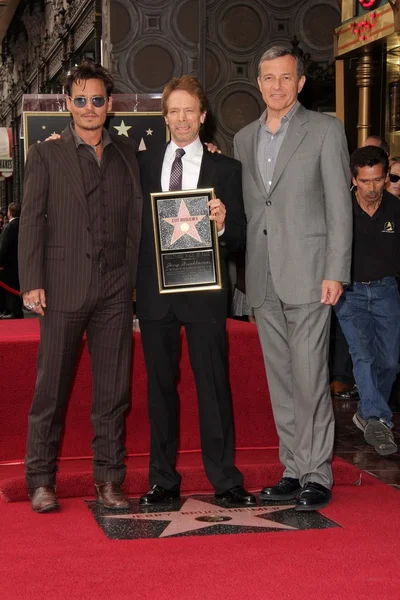 Johnny Depp, Bob Iger, Jerry Bruckheimer — Photo