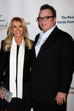 Joan Dangerfiel, Tom Arnold