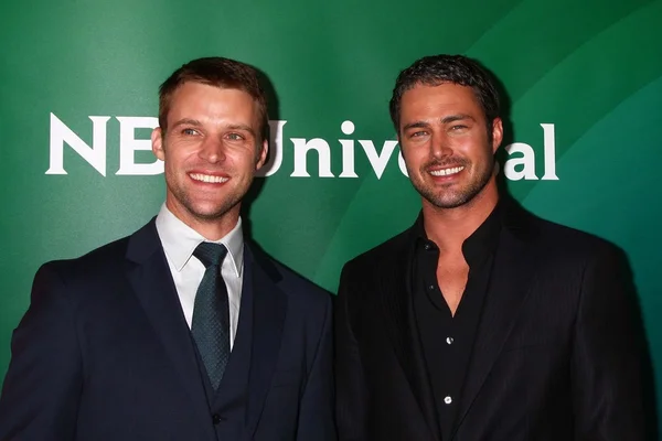 Jesse Spencer, Taylor Kinney — Stockfoto