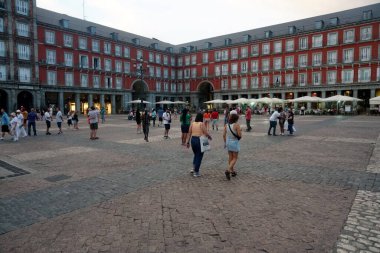 Madrid, Spain - June 13, 2022: Plaza Mayor square in Madrid in a beautiful summer evning                               