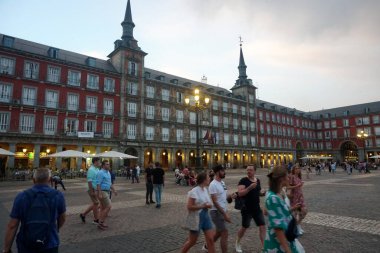 Madrid, Spain - June 13, 2022: Plaza Mayor square in Madrid in a beautiful summer evning                               