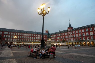 Madrid, Spain - June 13, 2022: Plaza Mayor square in Madrid in a beautiful summer evning                               