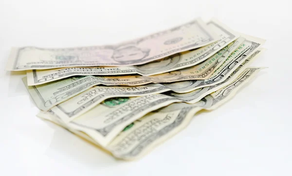 The edge of dollars bills at a shallow depth of field. — Stock Photo, Image