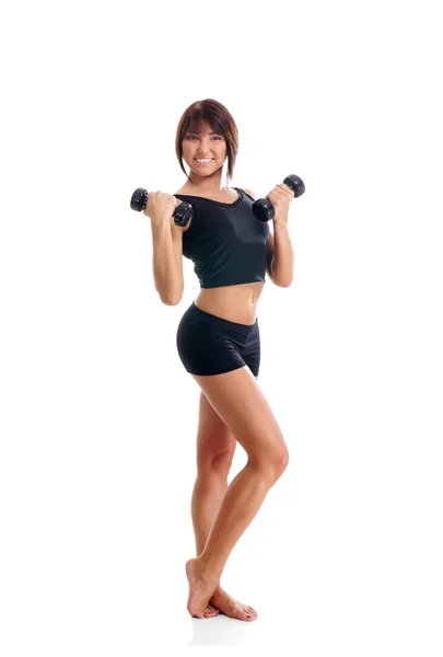 Een jong en fit brunette Kaukasische vrouw training — Stockfoto
