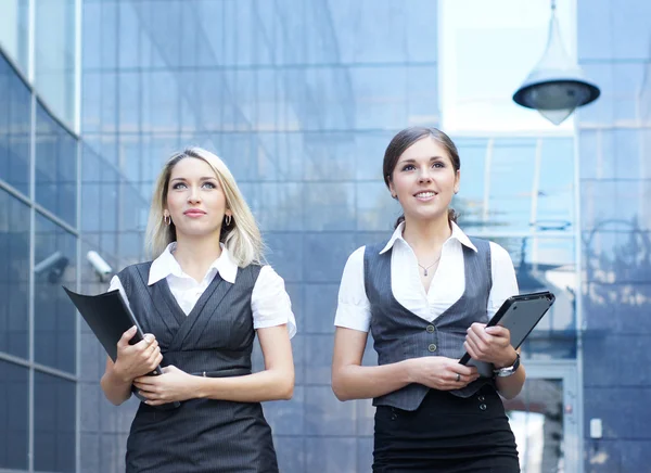 Business women over modern background — Stock Photo, Image