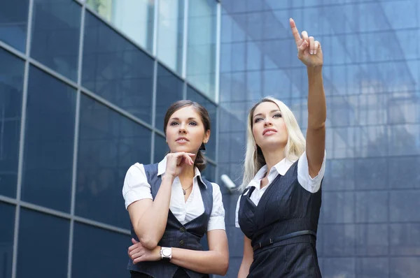 Business women over modern background — Stock Photo, Image