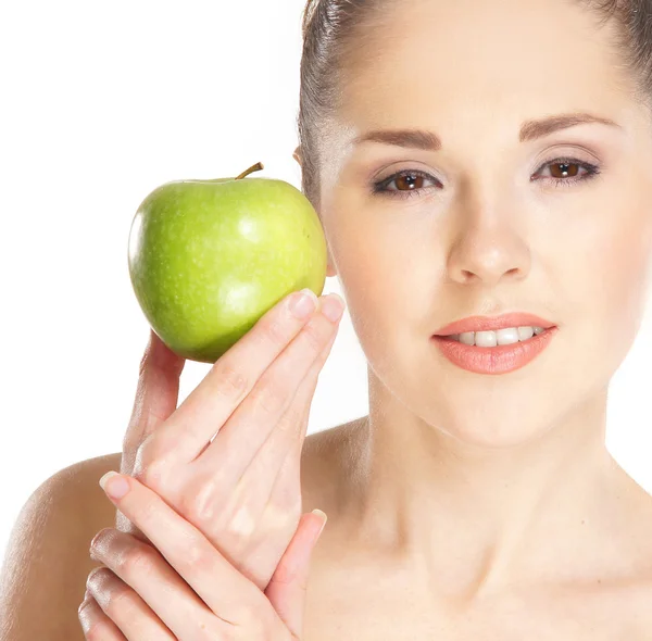 Joven chica deportiva con la manzana aislada en blanco — Foto de Stock