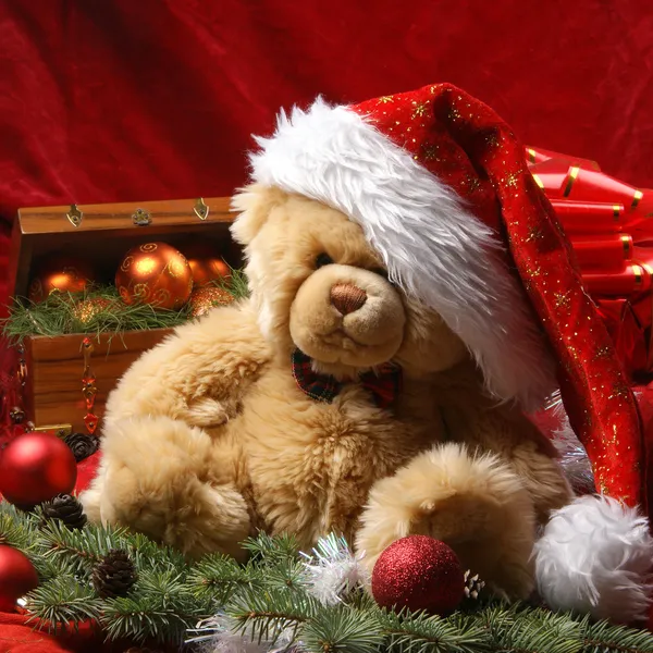 Fondo de Navidad con atractivo osito de peluche y otras cosas —  Fotos de Stock