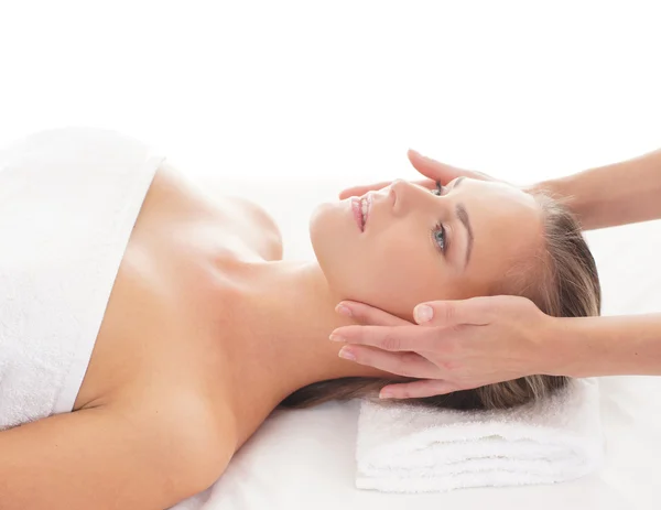 Young attractive woman getting massaging treatment — Stock Photo, Image