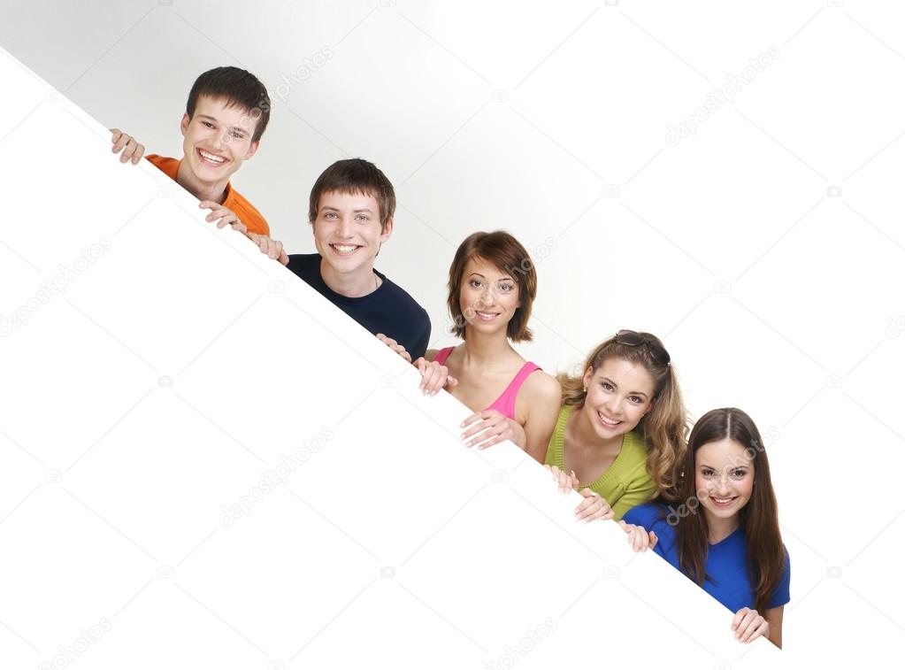 Group of teenagers with a giant, blank