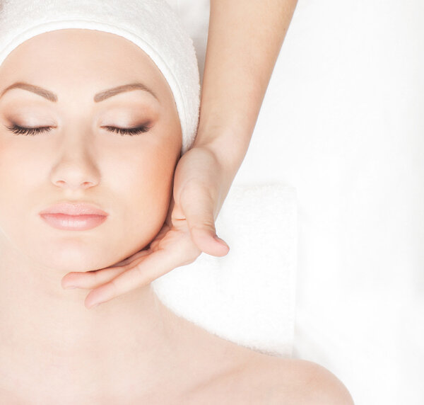 Young beautiful lady getting spa treatment