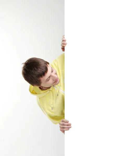 Boy with the blank banner. — Stock Photo, Image