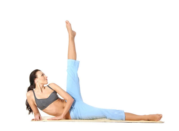 Young beautiful woman doing exercise — Stock Photo, Image